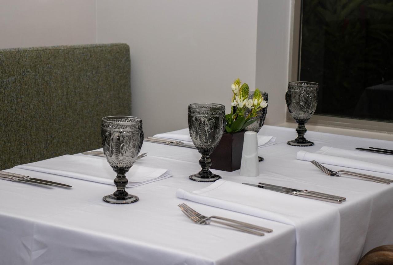 阿尔塔米拉星级酒店 Ibagué 外观 照片 A table set for a meal